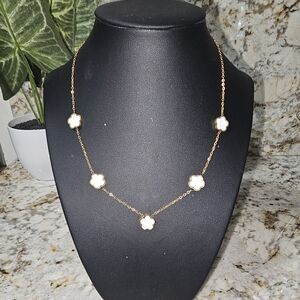 Beautiful clover necklace,  pearl white color, does not tarnish.